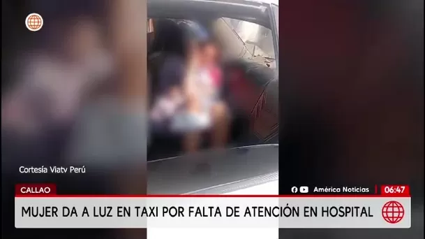 Mujer alumbra en estacionamiento del Hospital Sabogal/ América Noticias