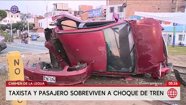 Taxista y pasajero sobreviven a choque con tren en Carmen de La Legua. Foto: América Noticias Taxista y pasajero sobreviven a choque con tren en Carmen de La Legua. Foto: América Noticias