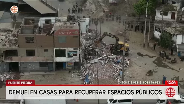 Demuelen casas para ampliar vía en Puente Piedra. Foto: América Noticias