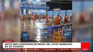 Escolares bailaron en el patio inundado de su colegio en Huánuco