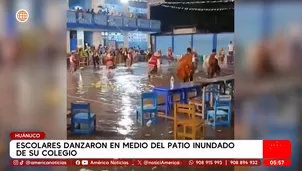 Escolares danzaron en medio del patio inundado de su colegio en Huánuco. Foto y video: América Noticias