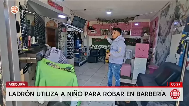 Hombre utiliza a niño para robar en una barbería en Arequipa. Foto: América Noticias Hombre utiliza a niño para robar en una barbería en Arequipa. Foto: América Noticias