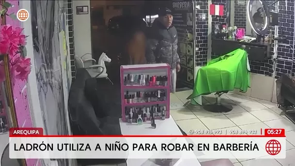 Hombre utiliza a niño para robar en una barbería en Arequipa. Foto: América Noticias Hombre utiliza a niño para robar en una barbería en Arequipa. Foto: América Noticias