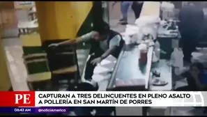 Policías detienen a asaltantes en restaurante.