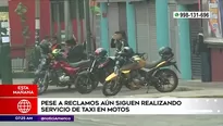 Servicio informal de taxi en moto.