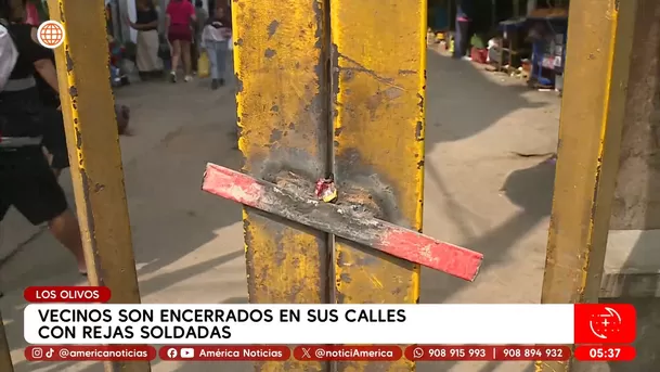 Vecinos son encerrados en sus calles con rejas soldadas en Los Olivos. Foto: América Noticias Vecinos son encerrados en sus calles con rejas soldadas en Los Olivos. Foto: América Noticias