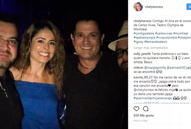 La mujer que le dio apasionado beso a Carlos Vives en pleno show