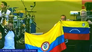 Los artistas se abrazaron y mostraron orgullosos las banderas de Venezuela y de Colombia. Foto y video: Canal N