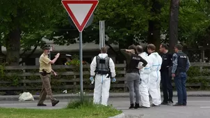 Forenses examinan lugar del asesinato. (Vía: AFP)