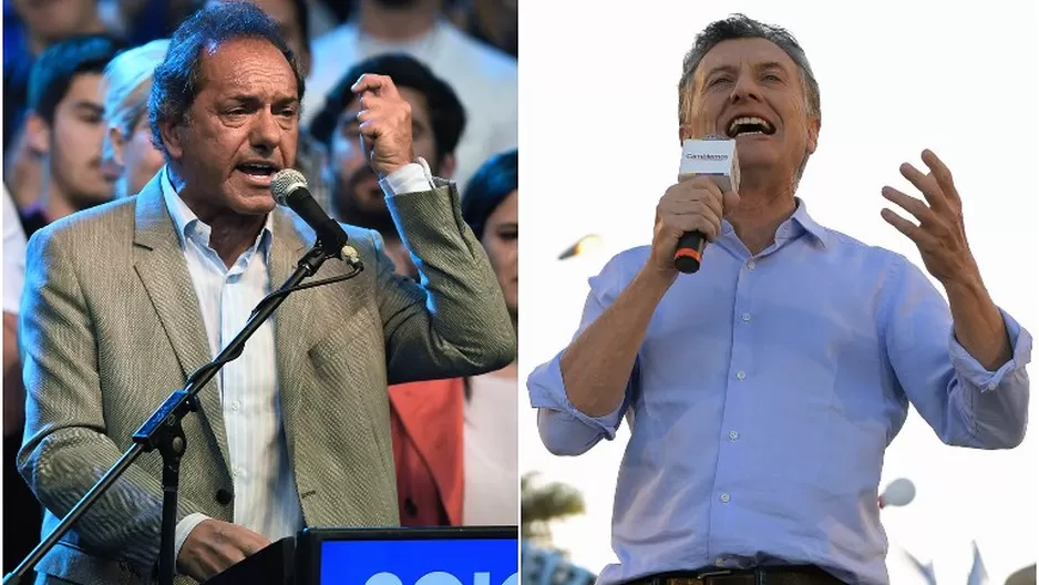 Daniel Scioli y Mauricio Macri. (Vía. AFP)