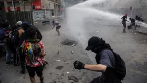 Chile: Niño fue detenido durante violentos disturbios. Foto: AFP