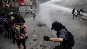 Chile: Niño fue detenido durante violentos disturbios. Foto: AFP