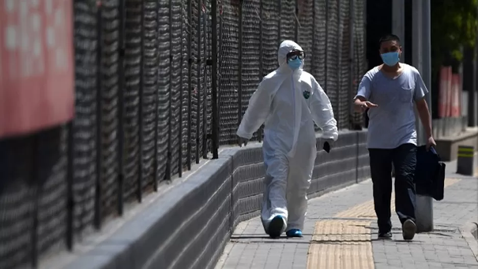 La capital de China, Pekín, extendió el lunes el área de cuarentena para incluir a otros 10 barrios. Foto: AFP