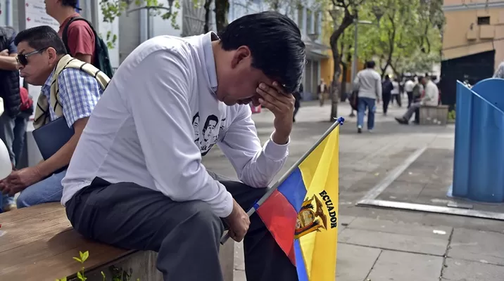 Amigos y familiares de los ecuatorianos asesinados están de luto. Foto: AFP Amigos y familiares de los ecuatorianos asesinados están de luto. Foto: AFP