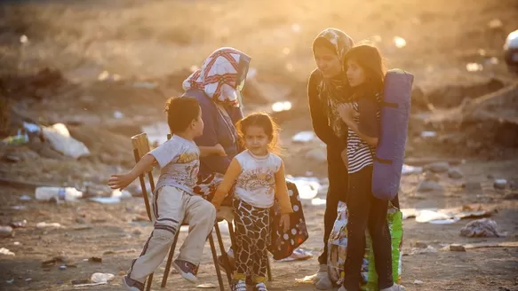 Familia de refugiados en Sira. (V&iacute;a: AFP)