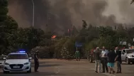 Grecia: Evacúan dos suburbios de Atenas por un fuerte incendio que ha quemado casas