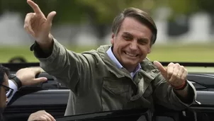 Una multitud se hab&iacute;a reunido desde varias horas antes de los anuncios frente a la casa de Bolsonaro. (Foto: AFP/Video: Canal N)