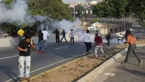 Enfrentamientos en los alrededores de La Carlota. Foto: EFE