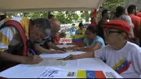 Venezuela: chavistas firman manifiesto para protestar ante la ONU por bloqueo de Estados Unidos. Foto y video: AFP