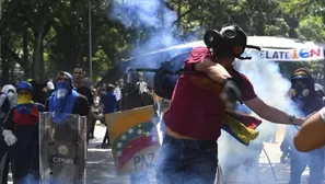 Venezuela: Estudiantes y policías se enfrentaron durante protesta contra Nicolás Maduro. Foto: AFP