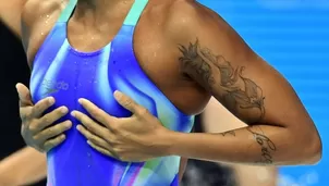 Tatuajes al descubierto en Mundial de Natación. Foto: AFP