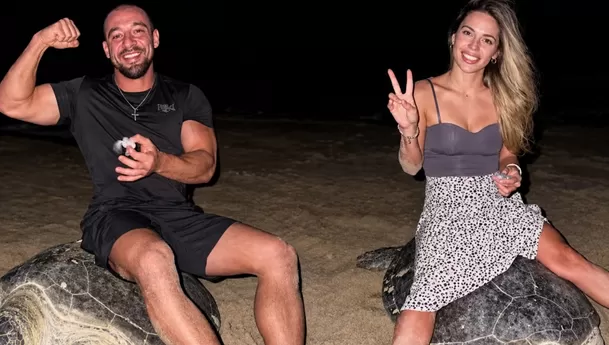 El influencer ucraniano Vadym Oleynik se sentó sobre una tortuga y generó indignación en redes sociales / Captura El influencer ucraniano Vadym Oleynik se sentó sobre una tortuga y generó indignación en redes sociales / Captura