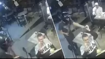 YouTube: Hombre no deja de comer sus alitas de pollo durante robo a mano armada en restaurante. Foto: Captura / Video: RT