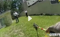 YouTube: Una policía usa una escoba para devolver a un caimán a un estanque - Noticias de agua