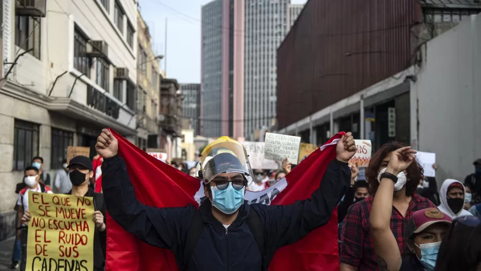 Consejos para prevenir la COVID-19 en una marcha (Foto: AFP)